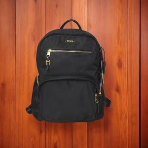 Tumi Black Backpack with Gold Accents